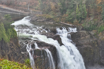 Wall Mural - 2020-11-19 WATERFALL IN THE PACIFIC NORTHWEST SEEN THROUGH A MORNING FOG