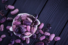  Beans With Black Spots On A Dark Background. Food Background