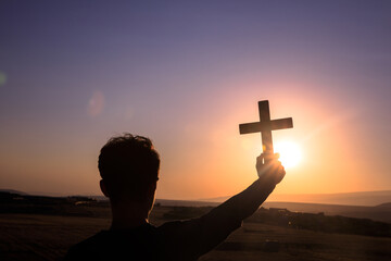 Sticker - man holding cross