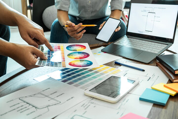 Wall Mural - professional creative team of web/graphic designer planning, drawing website ux app for mobile phone