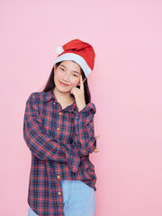 Wall Mural - teenage girl wearing santa hat