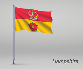 Waving flag of Hampshire - county of England on flagpole. Template for independence day poster design