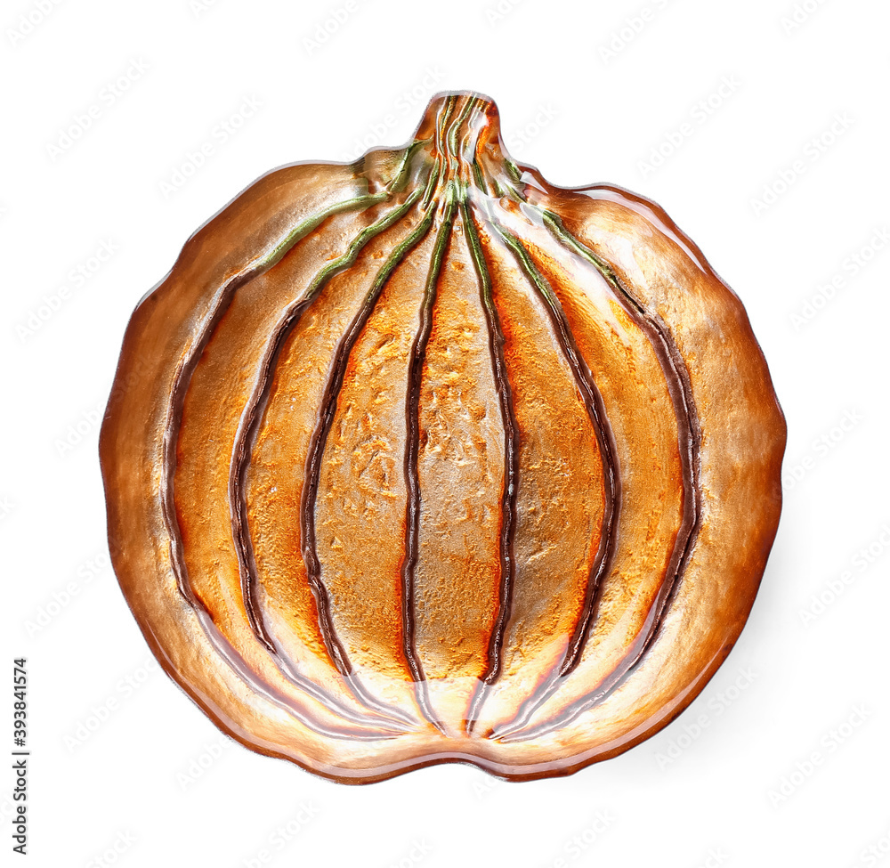 Beautiful plate in shape of pumpkin on white background