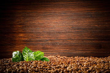 Sticker - Coffee beans on a wooden table with a free space for an advertising product