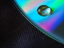Close-up Of Dew Over Compact Disc