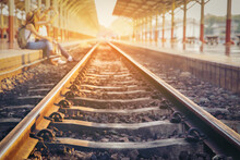 Sunlight Falling On Railroad Track At Platform
