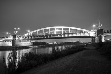 Poster - Steel structure of road bridge over the Warta river at night