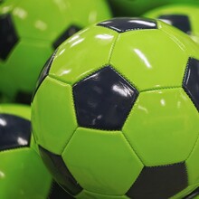 Full Frame Shot Of Green Soccer Balls