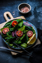 Wall Mural - Spinach salad with sesame seeds