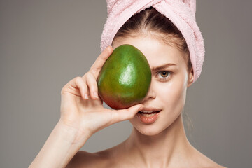 elegant woman mango in hand exotic vitamins clear skin