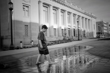 Boy Standing Against Nebraska State Capitol Building