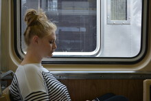 Profile View Of Woman Traveling In Train