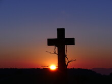 Silhouette Cross Against Sky During Sunset