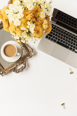 Wall Mural - Home office desk workspace with laptop, coffee cup, vintage tray, fall wildflowers bouquet on white background. Flat lay, top view girl boss work business concept for lifestyle blog, social media.