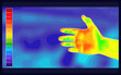 Vector graphic of Thermographic image of hands want to shake hands with someone on blurred background. Hands want to shake hands with someone showing different temperatures in range of colors.