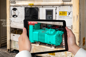 Engineer use augmented reality software in smart factory production line with automated application . Futuristic machinery in working in concept of Industry 4.0 or 4th industrial revolution.