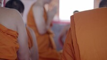 New Monk Ordination Ceremony In Theravada Buddhism In Thailand In Which The Ceremony Will Surround The Old Monks And Those Who Are Ordained.