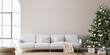 © lilasgh - Living Room Christmas interior in Scandinavian style. Christmas tree with gift boxes. white sofa on wall Mockup.