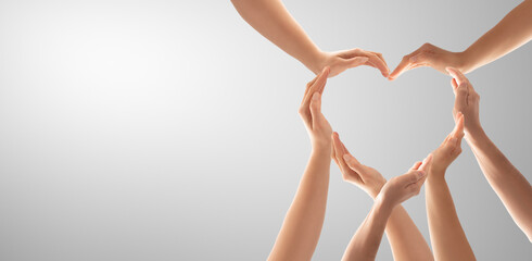 Fototapete - The concept of unity, cooperation, teamwork and charity.