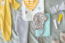 Composition With Baby Clothes