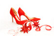 Christmas and New Year party outfit composition with red shoes and decorations.