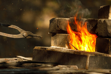 Sticker - a burning forge made of bricks in nature