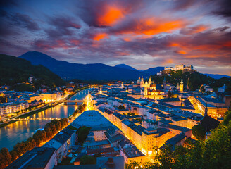 Fototapete - Salzburg city shining in the lights at night. Location place Salzburger Land, Austria, Europe.