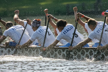 people racing a dragon boat