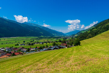 Wall Mural - Summer time countryside panoramic landscape in Austria near Mittersill village