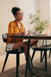 © Jacob Lund - Woman in teleconference meeting