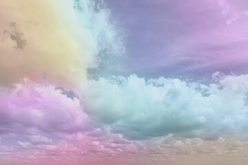 Wall Mural - fantasy world. picturesque view of beautiful magic sky with fluffy clouds, toned in pastel rainbow o