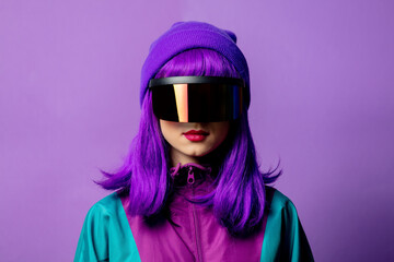 Wall Mural - Style woman in VR glasses and 80s tracksuit on violet background