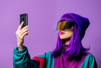 Wall Mural - Style woman in VR glasses and 80s tracksuit with mobile phone