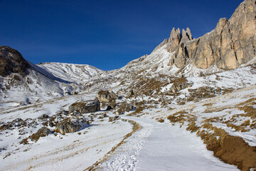 Wall Mural - First snow on the Italian mountains. Mountain winter landscape. View of the Beco di Mezzodì just sprinkled with snow.