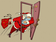 Santa Claus Is Kicking Down The Door In 2021. New Year And Christmas