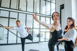 © lithiumphoto - Yoga class of young people group indoor