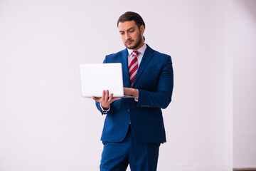 Wall Mural - Handsome male realtor working indoors