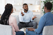 Family Psychotherapy. African American Couple Listening To Counselor's Advices During Therapy Session