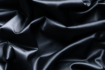 Wall Mural - Abstract dark blue silk background and texture with folds.