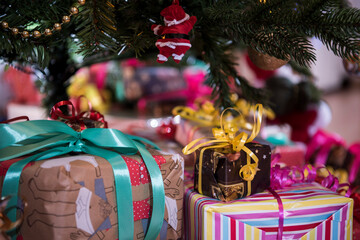Wall Mural - Gifts on the floor under the Christmas tree.