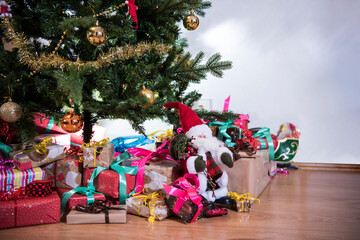 Wall Mural - Gifts on the floor under the Christmas tree.