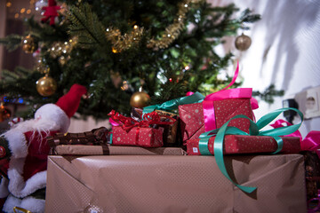 Wall Mural - Gifts on the floor under the Christmas tree.
