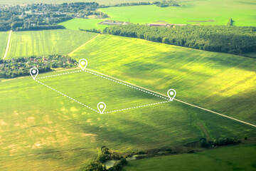 aerial view of green field, position point and boundary line to show location and area. a tract of l