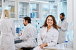 © Johnér - Smiling woman in laboratory, Sweden