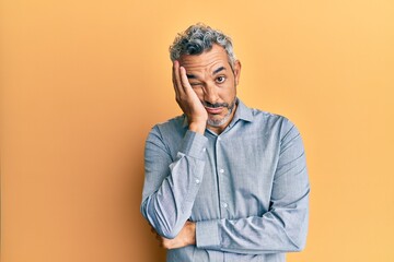 Sticker - Middle age grey-haired man wearing casual clothes thinking looking tired and bored with depression problems with crossed arms.