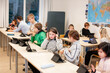 © Johnér - Children in classroom using digital tablet, Sweden