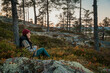 © Johnér - Female hiker relaxing with cup of coffee, Sweden