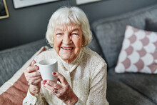 Senior Woman Holding Mug, Sweden