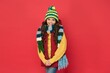 © be free - kid with happy face wearing warm winter clothing and get ready for holidays, vacation time
