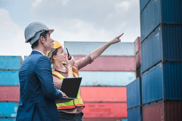 Wall Mural - Container Shipping Logistics Engineering of Import/Export Transportation Industry, Transport Engineers Teamwork Controlling Management Containers Together at Port Ship Loading Dock. Business Team